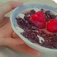 A picture of Oreo chocolate dessert with strawberry.