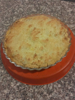 Una foto de Torta crumble de coco y dulce de leche