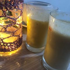A picture of Mango peach kiwi smoothy add qulfa mix.