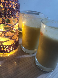 A picture of Mango peach kiwi smoothy add qulfa mix.