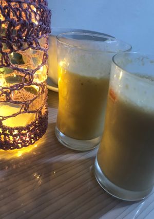A picture of Mango peach kiwi smoothy add qulfa mix.