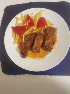 Una foto de Costillas al horno a mi manera