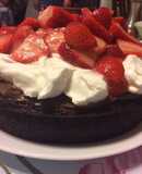 Decadent Chocolate Cake with Fresh Strawberries and Whipped Cream
