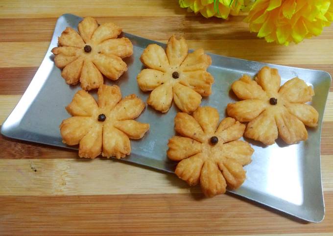 Flower shape mathri with wheat flour