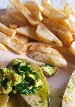 Una foto de Papas fritas veganas doble cocción