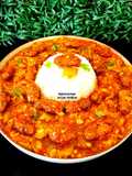 Methi Muthiya Tameta Galka Nu Shaak - Fist-Shaped Fried Methi Dumpling In Sponge Gourd Tomato Curry
