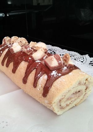 Una foto de Brazo de gitano relleno de kinder