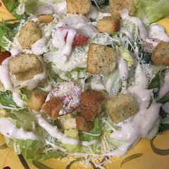 A picture of Caesar salad* vegetarian *.