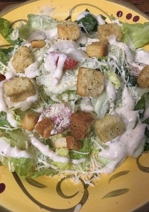 A picture of Caesar salad* vegetarian *.
