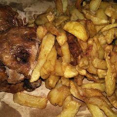 A picture of Fried chips and chicken.
