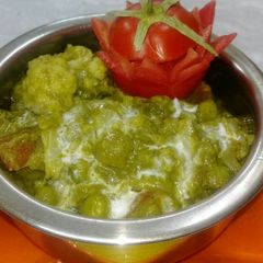 A picture of Haryali Veg Handi.