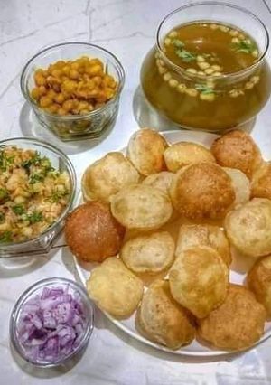A picture of PANIPURI /SPHERICAL CRISPY DISH FILLED WITH SPICY WATER.