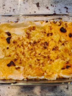 Una foto de Canelones de pollo y champiñones