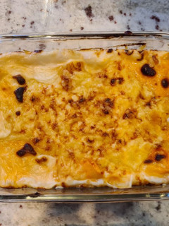 Una foto de Canelones de pollo y champiñones