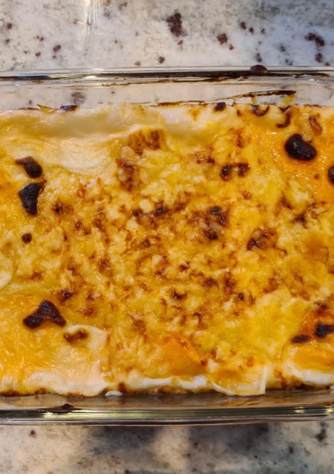 Una foto de Canelones de pollo y champiñones