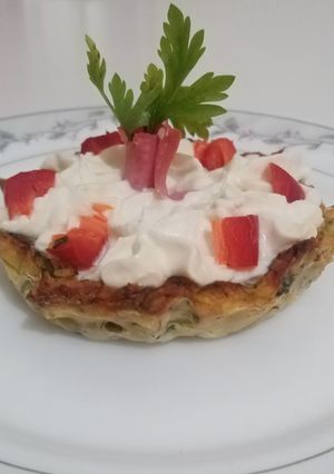 O poză a rețetei Tarte din dovlecei, umplute cu crema din brânză frământată.