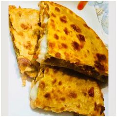 #Pizza Parantha A picture of #Pizza Parantha.