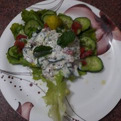 Mix salad with cucumber A picture of Mix salad with cucumber.