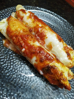 Una foto de Canelones de carne y espinaca 🥬🥩