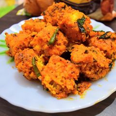 A picture of Fried Dhokla.