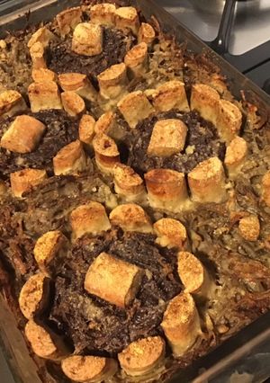 Une photo de Gratin aux deux pommes de terre,deux fromages et saucisses blanches