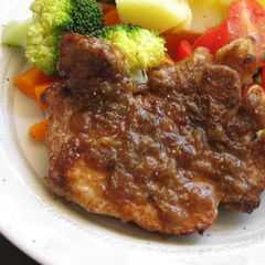 A picture of Onion-Marinated Pork Steaks.