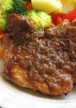 A picture of Onion-Marinated Pork Steaks.