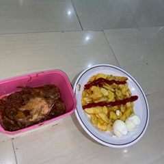 A picture of Fries and boiled eggs.