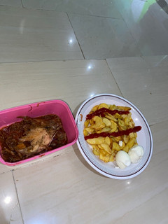 A picture of Fries and boiled eggs.
