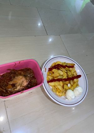 A picture of Fries and boiled eggs.