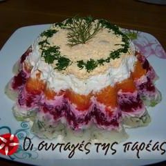 A picture of Christmas Salad like a pudding.