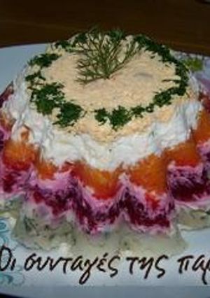 A picture of Christmas Salad like a pudding.