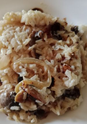 Una foto de Arroz con champiñones