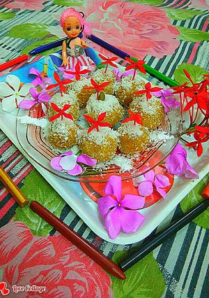 A picture of Mango coconut ladoo.