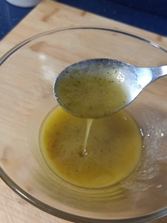 Una foto de Vinagreta de ajo confitado