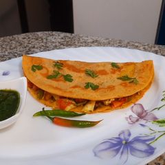 A picture of Stuffed Paneer Besan Chilla.