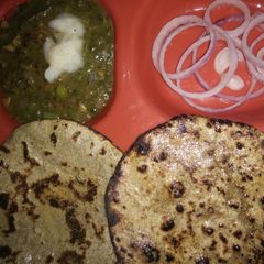 A picture of Millet's mix and bajra roti...or Palak methi ka saag.