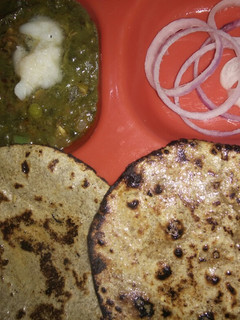 A picture of Millet's mix and bajra roti...or Palak methi ka saag.