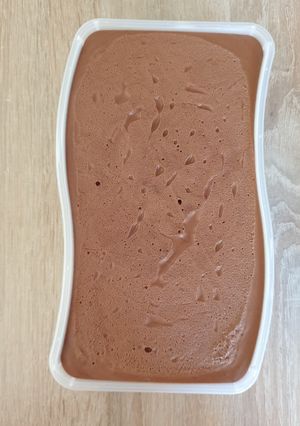A picture of Chocolate mousse with cream and egg yolk.
