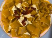Una foto di pasta zucca e spek