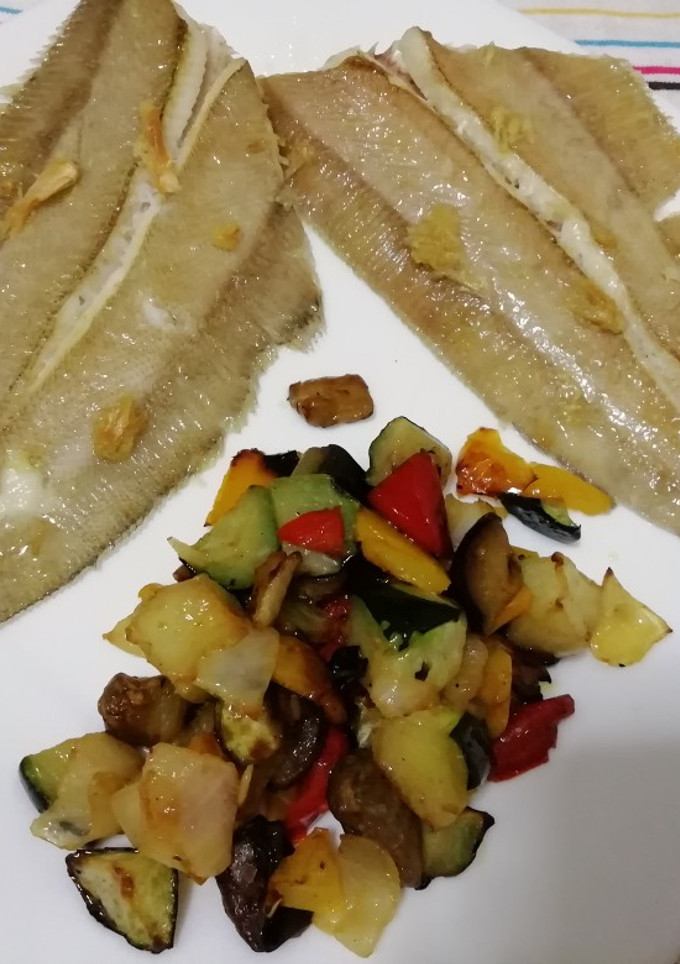 Una foto de Mendo asado con verduras