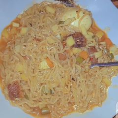 Watery indomie with Irish cubes A picture of Watery indomie with Irish cubes.