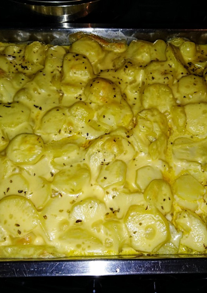 Una foto de Papas con crema y mostaza