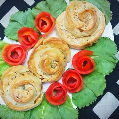 A picture of Baked chicken tikka roses.