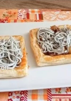 Una foto de Tartaletas de hojaldre con bacalao y gulas