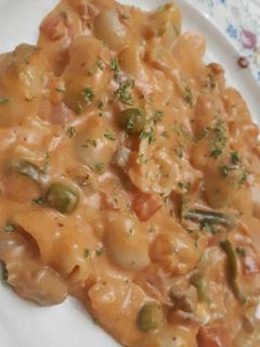 Una foto de Tiburones con salsa de tomate y queso