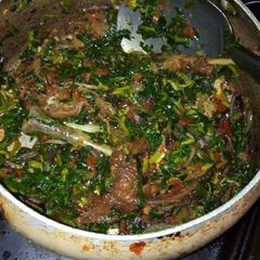 A picture of Water leaf and ugu soup.