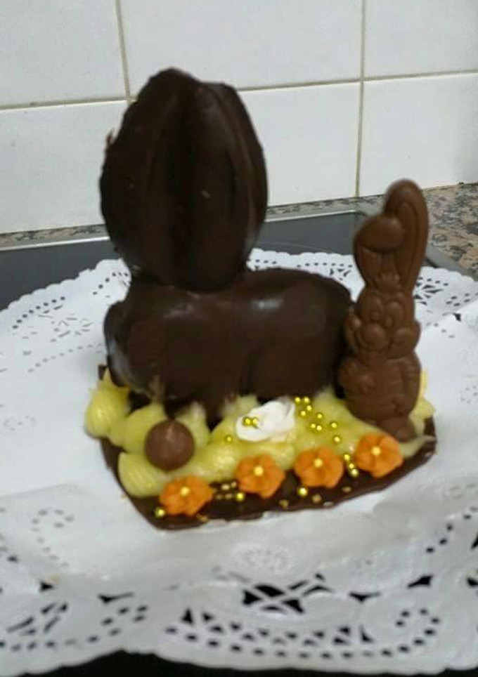 Una foto de Mona mamá conejo e hijo