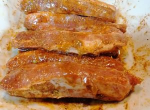 Foto principal de 299. Costillas y bistec en adobo de achiote