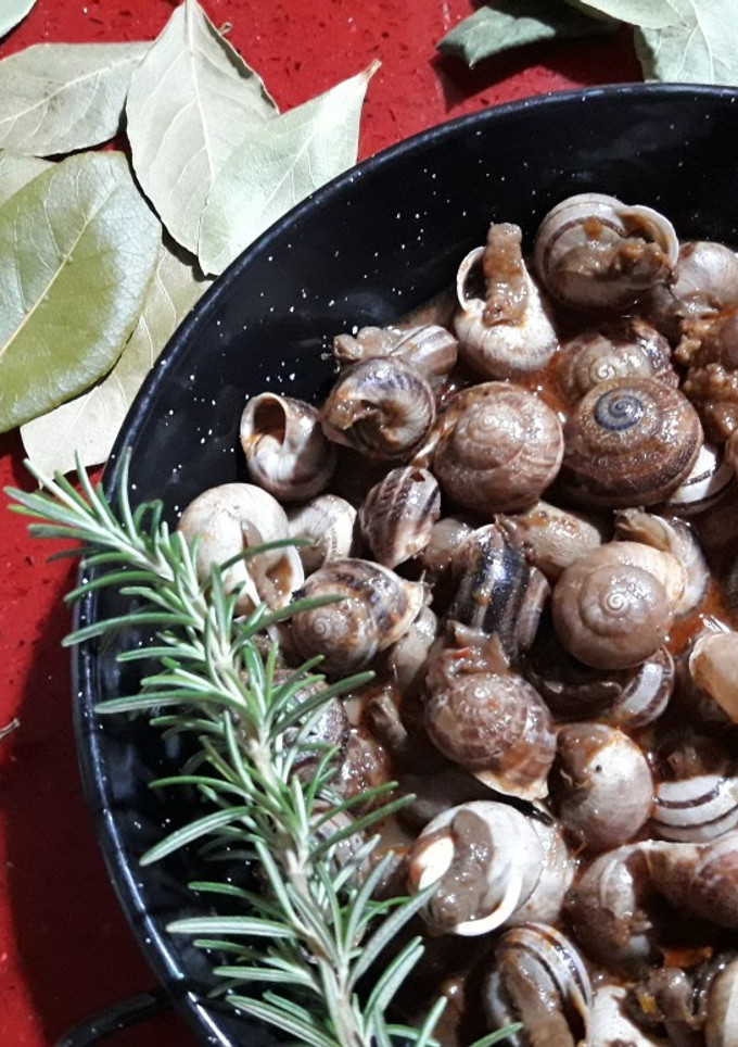 Una foto de Caracoles en salsa